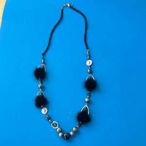 original Elegant black and silver Beaded  necklace with fur accent.